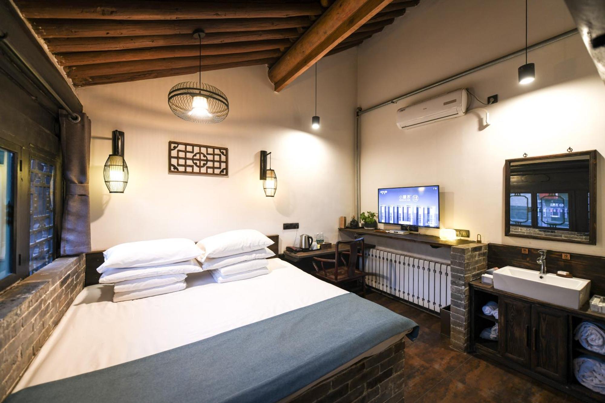 Elsewhere Hotel The Former Residence Of The Draft Bank Pingyao Eksteriør billede